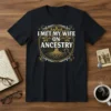 T-shirt with the text "I Met My Wife On Ancestry" above a tree of life graphic, featuring a magnifying glass