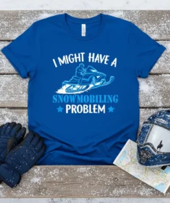 I Might Have A Snowmobiling Problem text with snowmobile graphic on a royal blue t-shirt, winter sports theme
