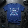 I Need a Hug From a Bad Bitch bold text design with wings and lightning graphics on a blue t-shirt