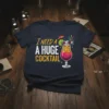 I Need A Huge Cocktail text with a colorful hurricane cocktail graphic, on a navy t-shirt