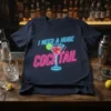 Navy t-shirt with neon "I Need A Huge Cocktail" design and martini glass graphic