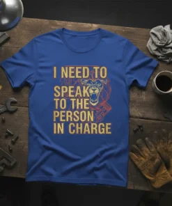 I Need to Speak to the Person in Charge t-shirt with a lion graphic and engine parts