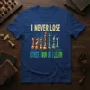 T-shirt with "I NEVER LOSE EITHER I WIN OR I LEARN" text and chess pieces graphic