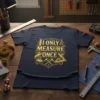 T-shirt with gold text "I Only Measure Once" featuring measuring tape, hammer, and triangle graphic