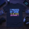 I Paused My Game To Be Here you're welcome neon text design on a dark t-shirt for gamers