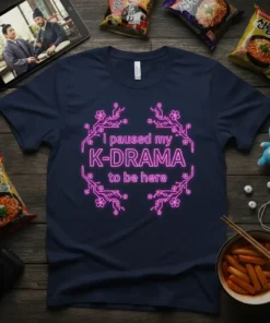 I Paused My K-DRAMA to be here quote with pink neon floral design on a navy blue t-shirt