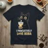 Black cat holding a boba tea cup with the text "I PAWSATIVELY LOVE BOBA" on a dark t-shirt