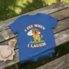 Golden retriever dog wearing sunglasses, peeing when laughing, with text "I Pee When I Laugh" on a blue t-shirt