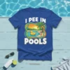 Blue t-shirt with "I Pee In Pools" text and a cartoon of a pool with a rubber duck and palm