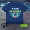 Funny "I Pee In Pools" quote with a dynamic swimmer graphic on a blue t-shirt