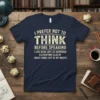 I Prefer Not To Think Before Speaking quote on a navy t-shirt, featuring distressed typography and a humorous message about