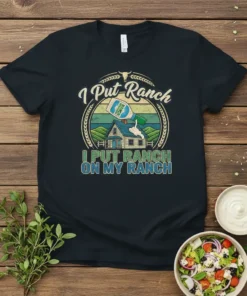 I Put Ranch ON MY RANCH t-shirt design featuring a bottle of ranch dressing pouring onto a house, with wheat