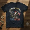 T-shirt design with text "I PUT THE 'TISM' IN PATRIOTISM" above an eagle holding a rifle and American flags, with