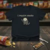 I require snacks text with a cute, grumpy possum holding a knife graphic on a navy t-shirt