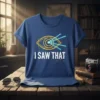 Blue t-shirt with a gold outline of an eye, blue laser beams, and the text "I SAW THAT" in white