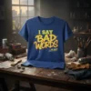 Blue t-shirt with yellow and red graffiti-style text reading "I SAY BAD WORDS ...A LOT"