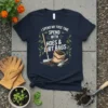 Gardener t-shirt with text "I Spend My Free Time Spend With Hoes & Lirt Bags" and illustration of gardening tools