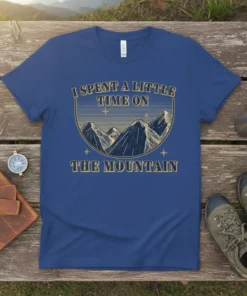 I Spent a Little Time on the Mountain quote with vintage mountain graphic on a blue t-shirt
