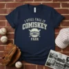 Navy blue t-shirt with "I STILL CALL IT COMISKEY PARK" in vintage collegiate font and stadium graphic