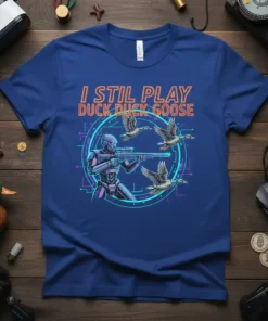 I Still Play Duck Duck Goose T-Shirt with retro gamer and duck hunting design, featuring a robot aiming a rifle