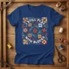 I Still Play With Blocks quote on a navy blue t-shirt surrounded by colorful quilt block designs and swirling patterns