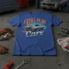 I Still Play With Cars vintage muscle car graphic tee, classic car design with bold typography and retro styling