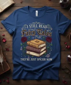 I Still Read Fairy Tales They're Just Spicier Now quote with stacked books and roses design on a blue t-shirt