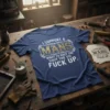 Navy blue t-shirt with white text "I SUPPORT A MANS RIGHT TO SHUT THE UO FUCK UP." and gold decorative