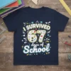 I SURVIVED 67 days of School text with school icons and graduation caps on a navy blue t-shirt