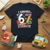 I SURVIVED 67 DAYS OF SCHOOL text with fun school-themed graphics including pencils, apples, and hearts on a navy t-shirt