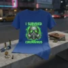 I Survived Coronavirus text with a detailed gas mask graphic in neon green and grey on a blue t-shirt