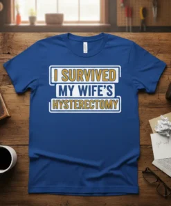 Blue t-shirt with "I Survived My Wife's Hysterectomy" text in white and yellow, humorous husband gift