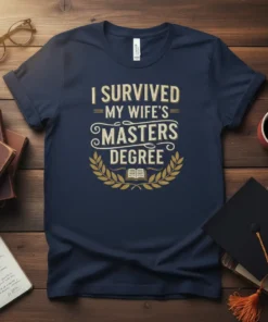 I Survived My Wife's Masters Degree text with laurel wreath and book graphic on a navy t-shirt