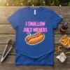 Blue t-shirt with neon pink text "I Swallow Juicy Wieners" above a graphic of a hot dog