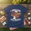 Funny t-shirt with text "I Swallow Juicy Wieners" featuring a cartoon hot dog character holding a hot dog and fork