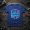 I TALK TO EVERYONE MOVING ME WON'T HELP quote on a blue t-shirt, surrounded by neon pink and blue circuit