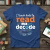T-shirt with the text "I teach kids to read and decode" in orange and white, featuring graphic elements of books
