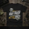 Black t-shirt with white and yellow text "I Try To Make Things Idiot Proof But They Keep Making Better Idiots"