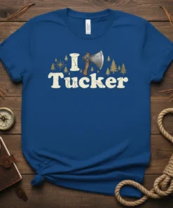 Blue t-shirt with "I Tucker" text, axe graphic, compass, and pine trees