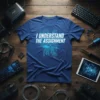 I Understand The Assignment quote on a blue t-shirt with circuit board graphic, for tech enthusiasts