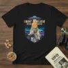 I WANT TO BELIEVE (IN UNLIMITED TREATS) cat UFO t-shirt design with a tabby cat being beamed up by a