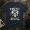 I Was Born To Criminal t-shirt featuring a raccoon holding a diamond with city skyline in the background and distressed