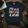 Navy blue t-shirt with white text "I Was Fighting A Bear" and a graphic of a roaring bear face and
