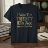 T-shirt with text "I Was Fun TWENTY IEPs Ago" in vintage distressed font, featuring an arrow and heart graphic