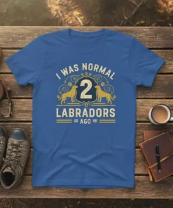I Was Normal 2 Labradors Ago quote on a blue t-shirt with golden labrador graphics and paw prints