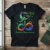 T-shirt with "I Wear Green For Bronchiolitis Obliterans Awareness" text, featuring a colorful infinity symbol, a bird, and green leaves