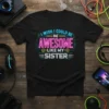T-shirt with neon-style text "I Wish I Could Be Awesome Like My Sister" on a black background