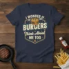 I Wonder If Burgers Think About Me Too funny burger quote t-shirt design with a cartoon burger graphic