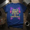 Bold statement t-shirt with the quote "I Won't Be Quiet So You Can Be Comfortable" in gold and colorful lightning