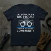I Work In A Big House In A Gated Community quote on navy t-shirt with handcuffs and building graphic